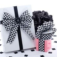 Wrapped Gift Boxes Black Paper Flowers Decorations Square Gift Tag Stock  Photo by ©karissaa 606508304