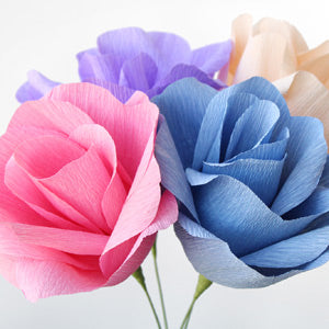 pink, blue, purple, and natural paper flowers made from Paper Mart crepe paper