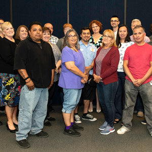 Paper Mart Team Celebrates Decades Of Dedication